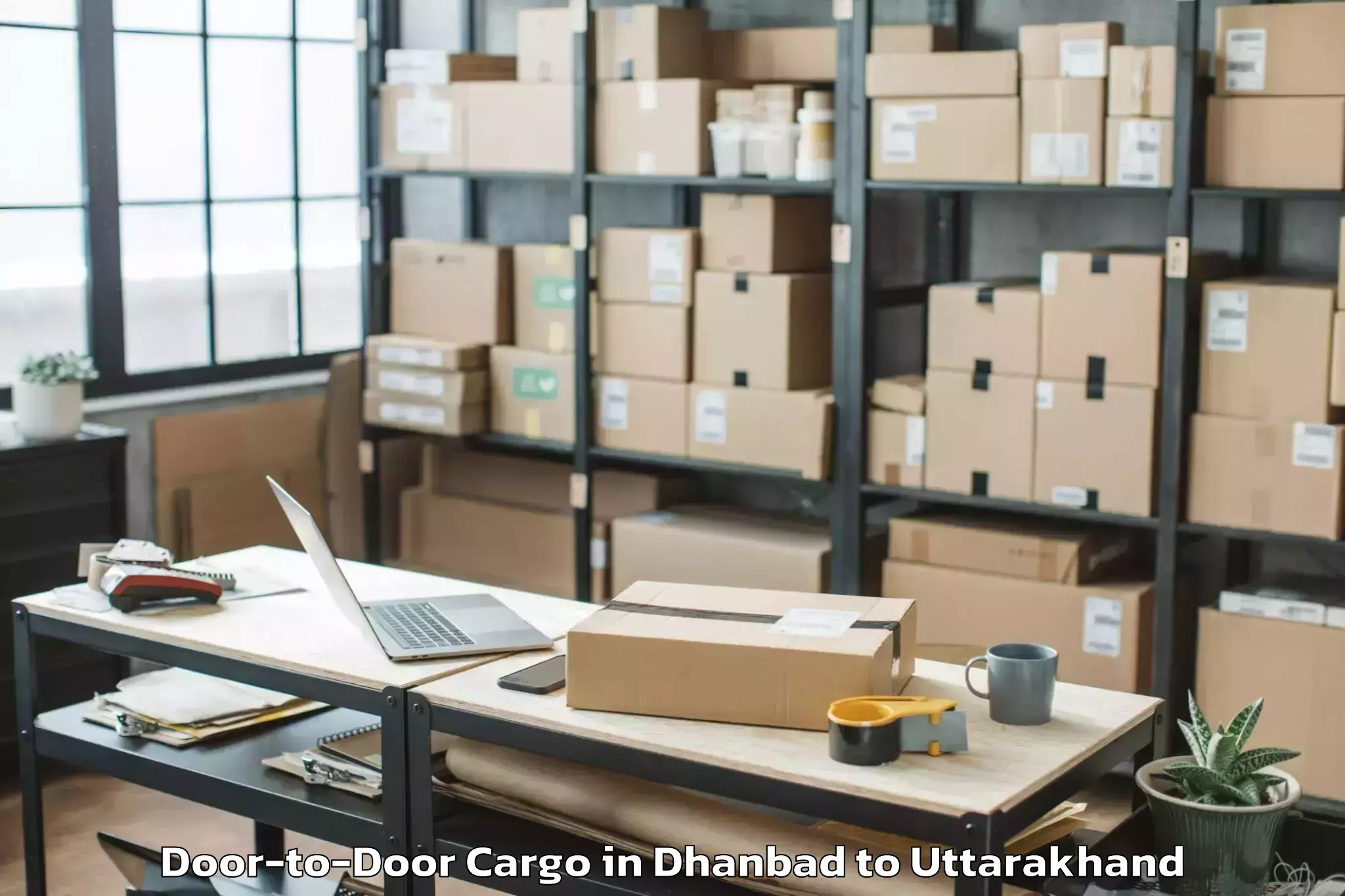 Easy Dhanbad to Herbertpur Door To Door Cargo Booking